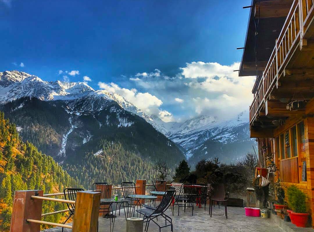 Mountain peaks framing the homestay deck